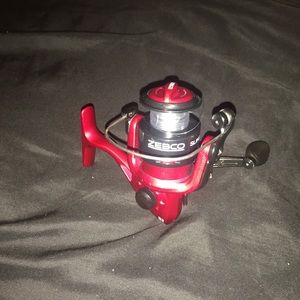 A red zebco spinning reel